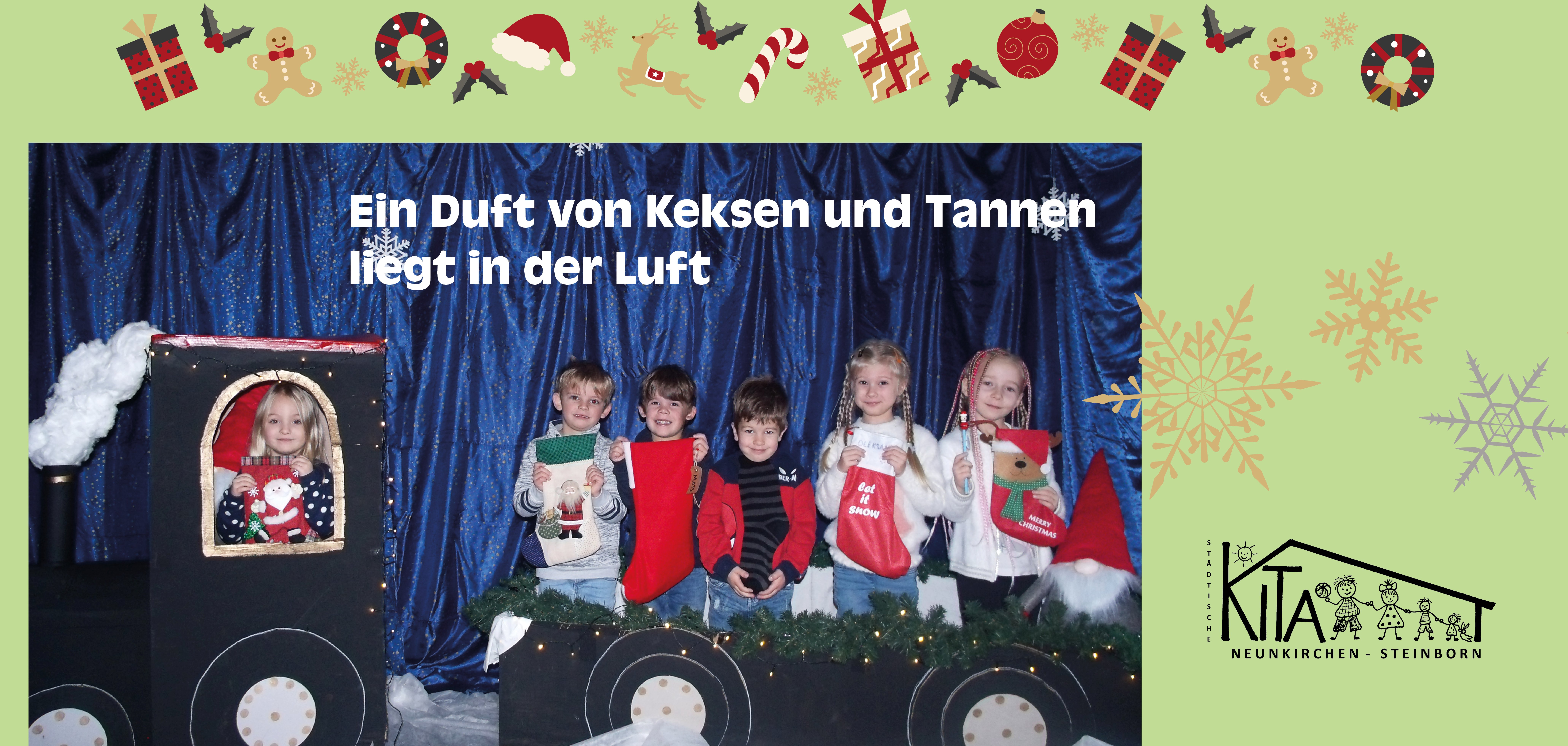 Kindern hinter gebastelter Lokomotive