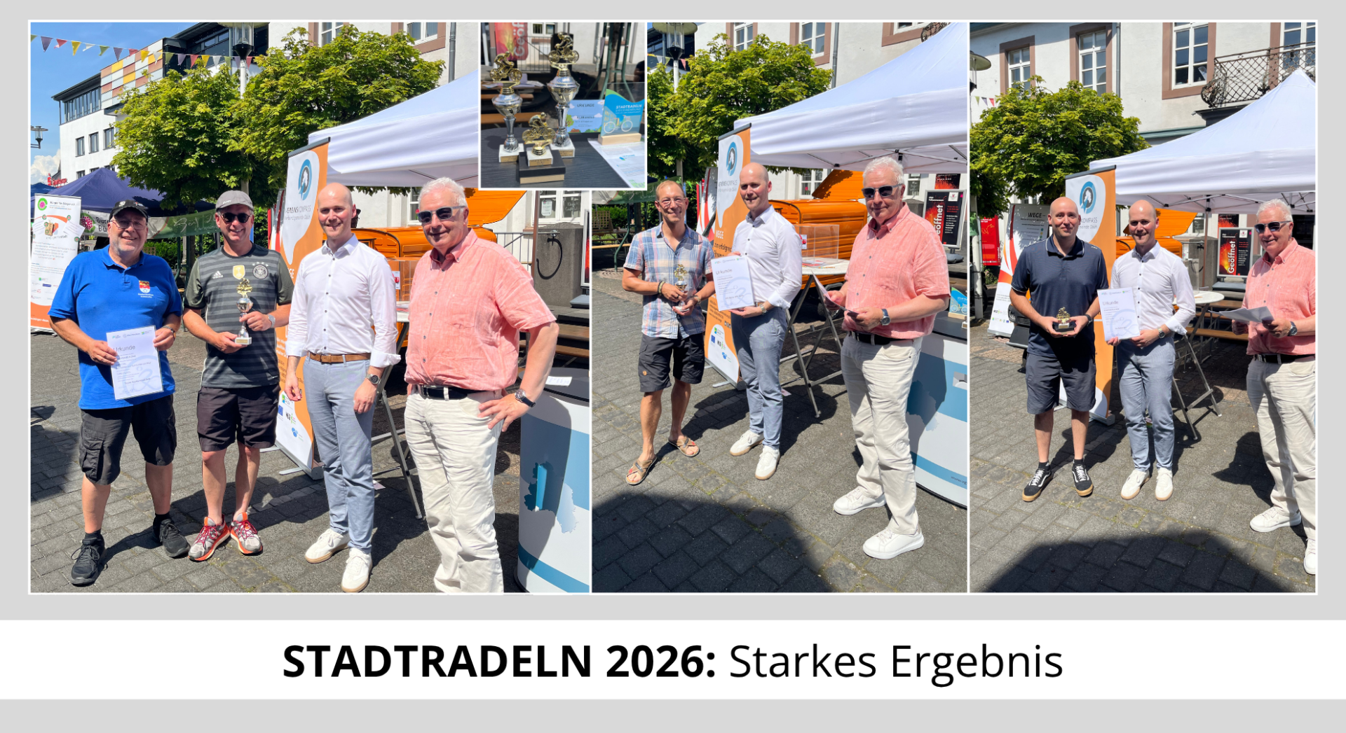 Siegerehrung; Personen mit Pokal in der Hand